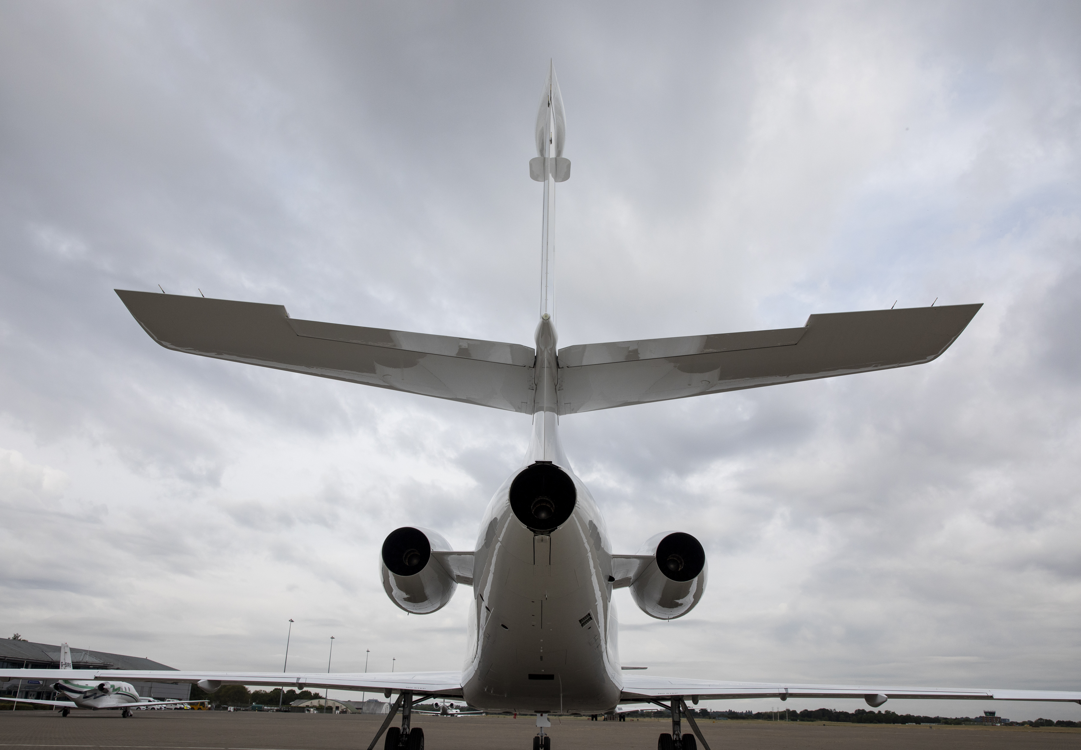 Image shows rear view of the Envoy aircraft on the airfield.